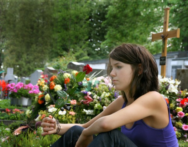 young woman at the cemetery